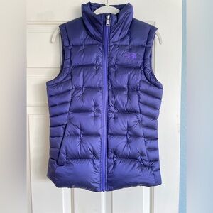 The North face purple puffer vest youth size 14/16 like new